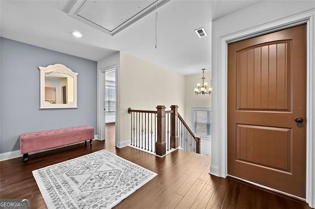 5825 Trailwood Ct, Suwanee, GA 30024 - foyer featuring healthy amount of natural light, wood finished floors, and recessed lighting