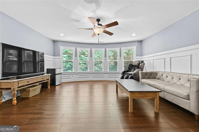 5825 Trailwood Ct, Suwanee, GA 30024 - living area with a decorative wall, wainscoting, ceiling fan, dark wood-style flooring, and recessed lighting