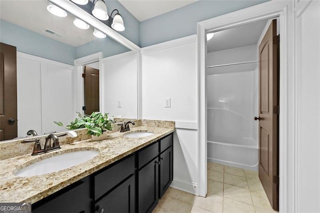 5825 Trailwood Ct, Suwanee, GA 30024 - bathroom with double vanity, tile patterned flooring, and tub / shower combination