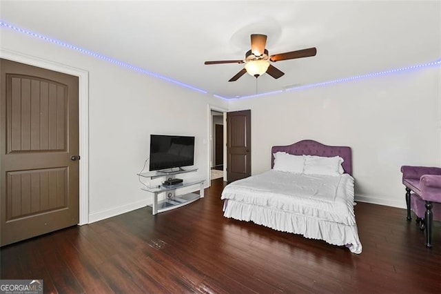 5825 Trailwood Ct, Suwanee, GA 30024 - bedroom featuring wood finished floors and a ceiling fan