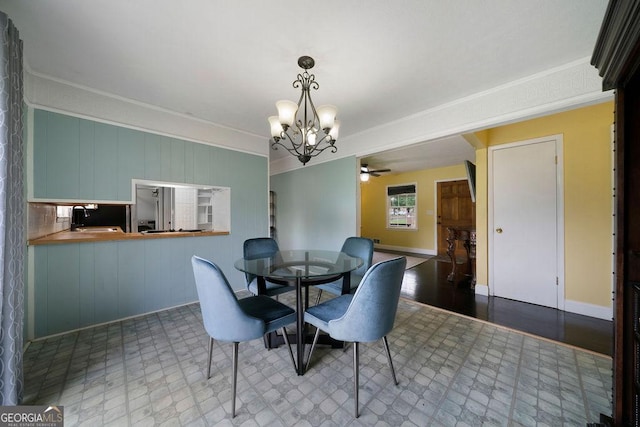 213 Cook St, Cartersville, GA 30120 - dining area featuring a chandelier, crown molding, and ceiling fan
