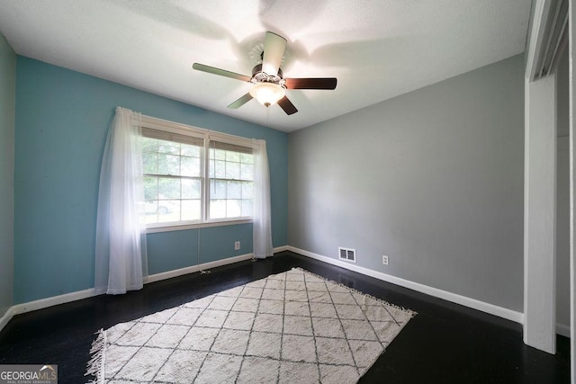 213 Cook St, Cartersville, GA 30120 - unfurnished room featuring a ceiling fan and dark wood finished floors