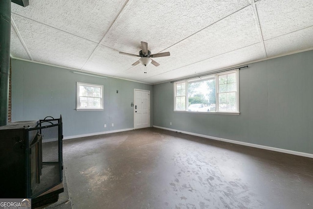 213 Cook St, Cartersville, GA 30120 - empty room with a ceiling fan, concrete flooring, and plenty of natural light