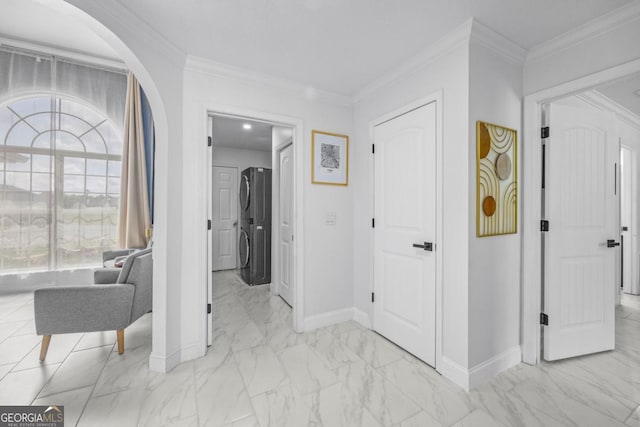 513 Cascade Ct, Hinesville, GA 31313 - corridor with light marble finish floors, arched walkways, and crown molding