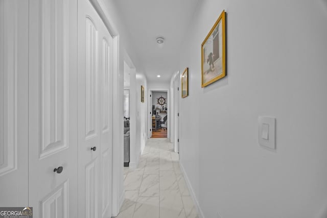 513 Cascade Ct, Hinesville, GA 31313 - corridor with light marble finish floors and recessed lighting