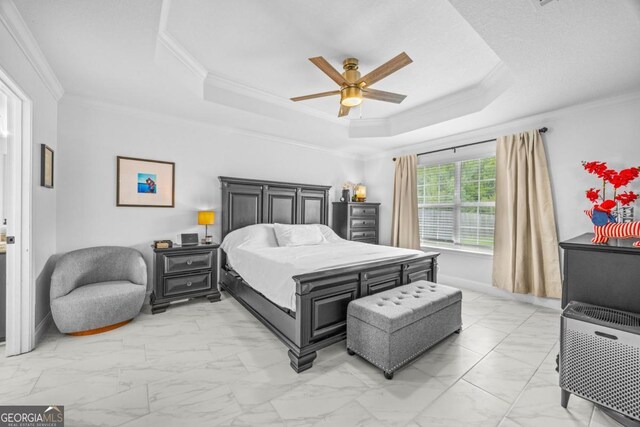 513 Cascade Ct, Hinesville, GA 31313 - bedroom featuring light marble finish flooring, a raised ceiling, crown molding, and a ceiling fan