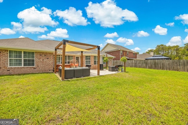513 Cascade Ct, Hinesville, GA 31313 - back of house with outdoor lounge area, brick siding, a fenced backyard, and a patio area