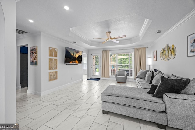 513 Cascade Ct, Hinesville, GA 31313 - living room with ornamental molding, a raised ceiling, a ceiling fan, light marble finish flooring, and recessed lighting