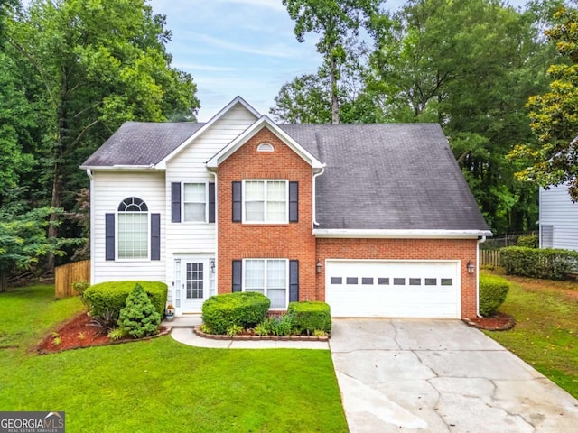 3229 Dunlin Lake Rd, Lawrenceville, GA 30044 - view of front facade with driveway, brick siding, a garage, and a shingled roof
