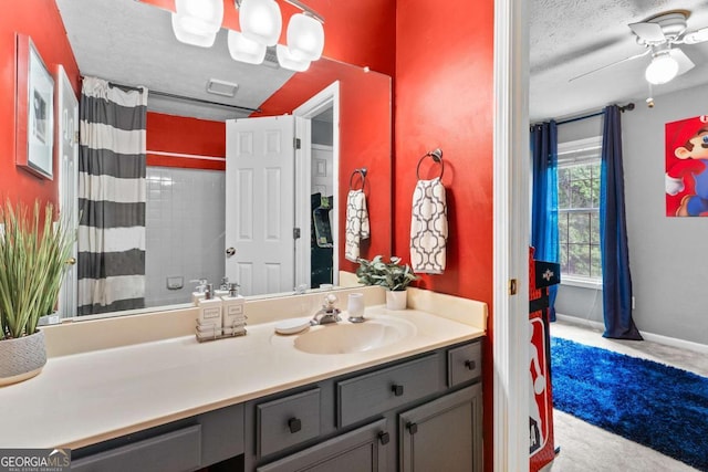 3229 Dunlin Lake Rd, Lawrenceville, GA 30044 - bathroom featuring vanity, a shower with curtain, a textured ceiling, and ceiling fan