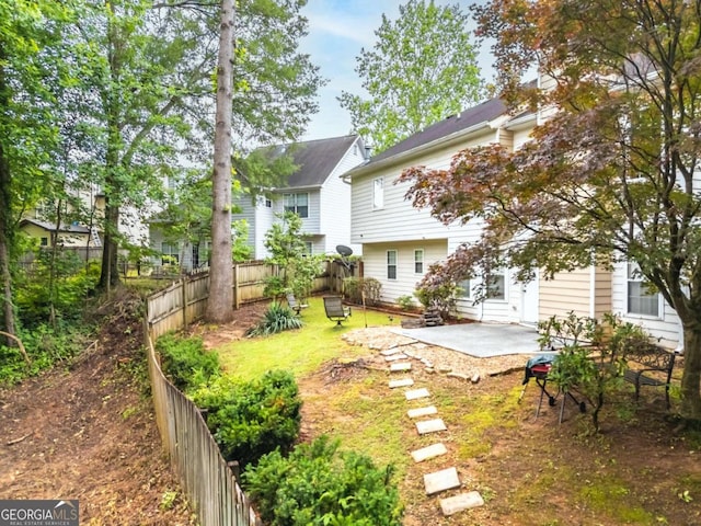 3229 Dunlin Lake Rd, Lawrenceville, GA 30044 - fenced backyard featuring a patio area