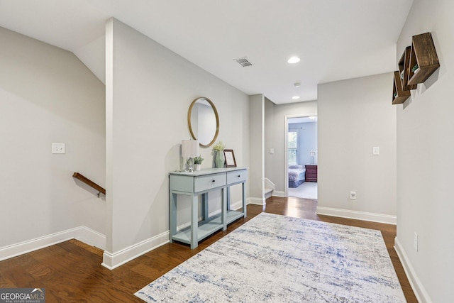 8215 Harlond Way, Suwanee, GA 30024 - hall featuring dark wood-style flooring, recessed lighting, and an upstairs landing