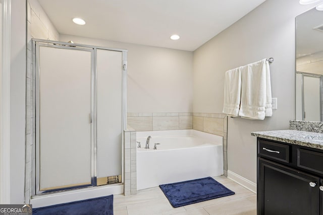 8215 Harlond Way, Suwanee, GA 30024 - full bath with a stall shower, vanity, a bath, and recessed lighting