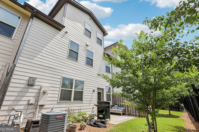 8215 Harlond Way, Suwanee, GA 30024 - back of house featuring a fenced backyard and a patio