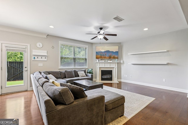 8215 Harlond Way, Suwanee, GA 30024 - living area with ceiling fan, wood finished floors, a fireplace with flush hearth, and recessed lighting