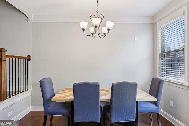 8215 Harlond Way, Suwanee, GA 30024 - dining area featuring a chandelier, crown molding, and dark wood-style floors