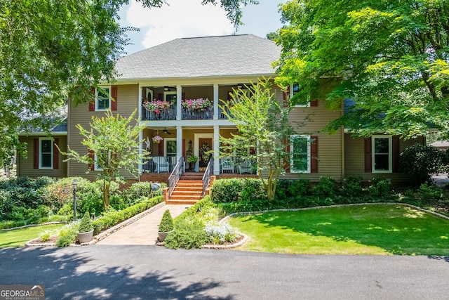 6180 Old Jefferson Rd, Athens, GA 30607 - view of front facade with a ceiling fan, a porch, a front lawn, stairway, and a balcony