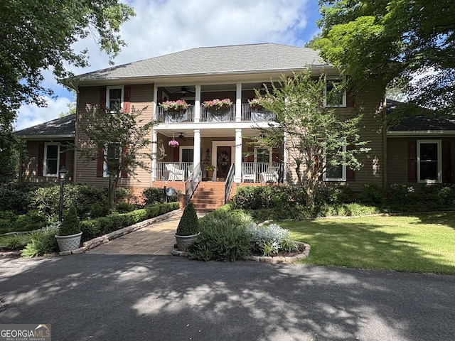 6180 Old Jefferson Rd, Athens, GA 30607 - view of front of property featuring a ceiling fan, covered porch, a balcony, a front yard, and stairway