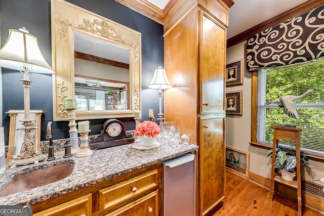 6180 Old Jefferson Rd, Athens, GA 30607 - bathroom featuring ornamental molding, wood finished floors, healthy amount of natural light, and vanity
