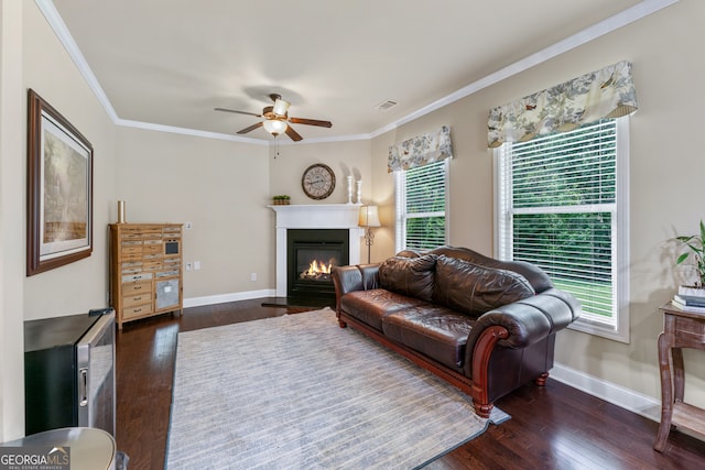 1626 Waterchase Dr, Dacula, GA 30019 - living room featuring ceiling fan, dark wood-style floors, plenty of natural light, and crown molding