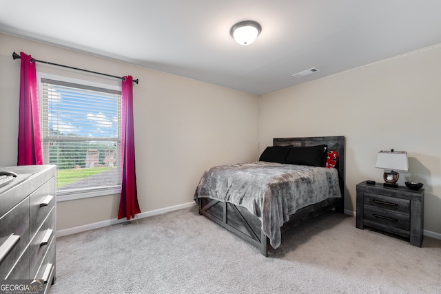 1626 Waterchase Dr, Dacula, GA 30019 - bedroom featuring light colored carpet and baseboards