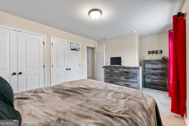 1626 Waterchase Dr, Dacula, GA 30019 - bedroom featuring multiple closets and carpet