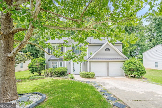 4959 Abbotts Glen Trl NW, Acworth, GA 30101 - view of front of home featuring a garage, concrete driveway, a front yard, and a metal roof
