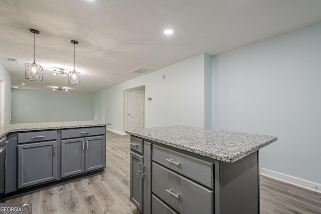4959 Abbotts Glen Trl NW, Acworth, GA 30101 - kitchen with gray cabinetry, light wood-style flooring, decorative light fixtures, and recessed lighting