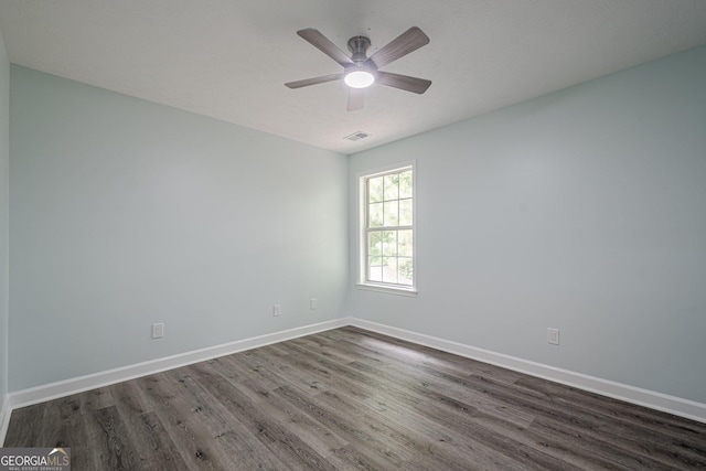 4959 Abbotts Glen Trl NW, Acworth, GA 30101 - unfurnished room featuring dark wood-style flooring and ceiling fan