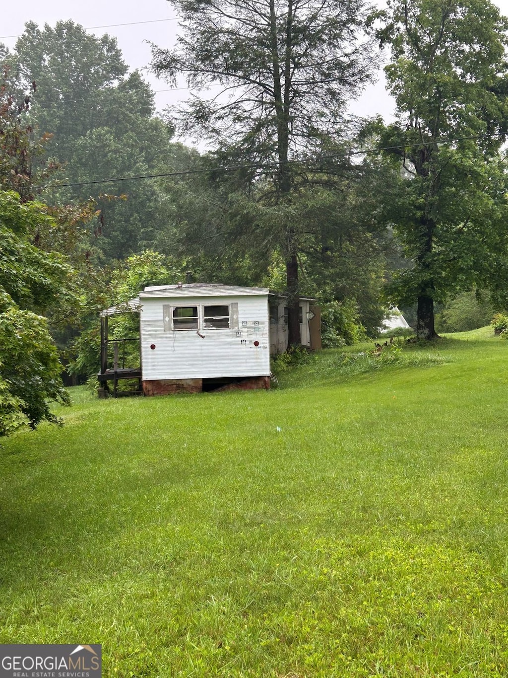 5538 Ransom Free Rd, Clermont, GA 30527 - view of grassy yard featuring an outbuilding