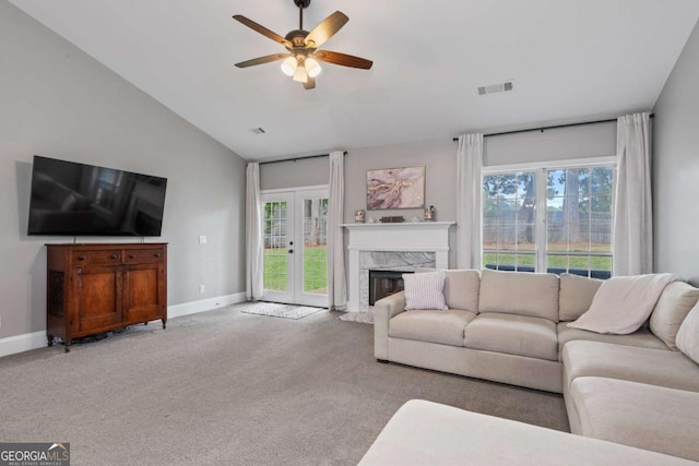 192 Sandhurst Ct, Suwanee, GA 30024 - carpeted living area featuring a ceiling fan, plenty of natural light, lofted ceiling, and a high end fireplace