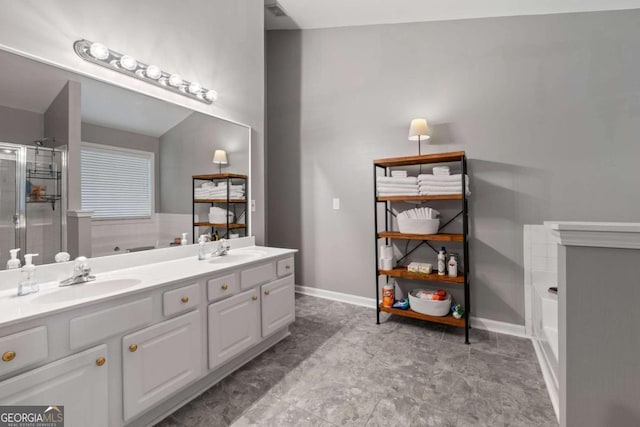 192 Sandhurst Ct, Suwanee, GA 30024 - full bath featuring a bath, a stall shower, and double vanity