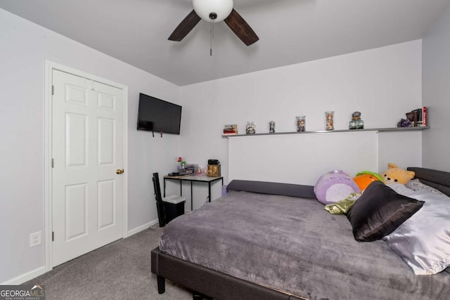 192 Sandhurst Ct, Suwanee, GA 30024 - carpeted bedroom featuring baseboards and ceiling fan