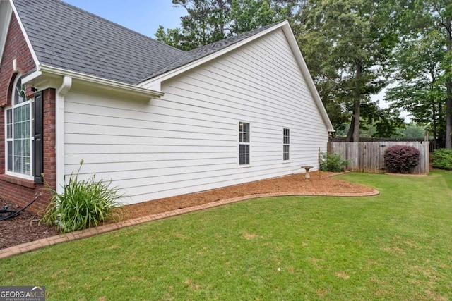 192 Sandhurst Ct, Suwanee, GA 30024 - view of property exterior featuring roof with shingles and brick siding