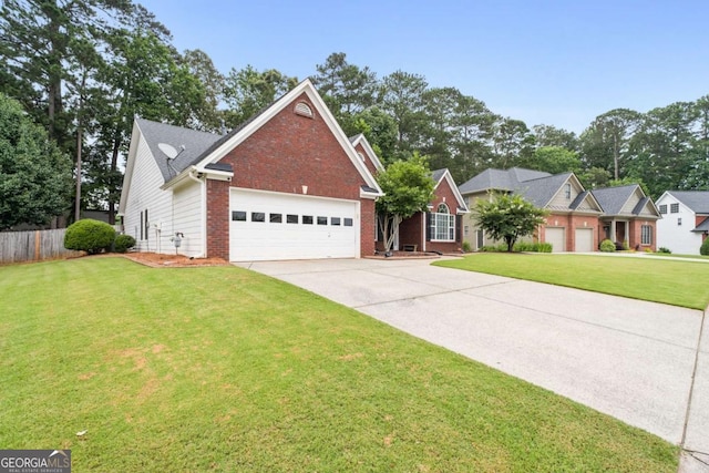 192 Sandhurst Ct, Suwanee, GA 30024 - view of front of home with brick siding, an attached garage, and driveway