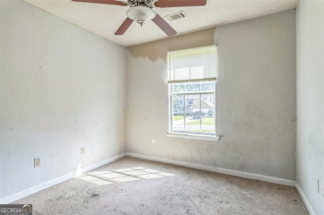 3376 Trotters Ridge Trl, Gray, GA 31032 - empty room featuring carpet floors, ceiling fan, and a textured ceiling