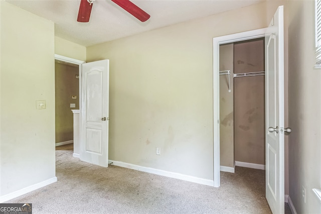 3376 Trotters Ridge Trl, Gray, GA 31032 - unfurnished bedroom with carpet, a closet, and ceiling fan