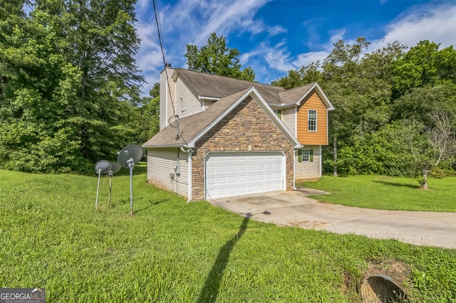 3376 Trotters Ridge Trl, Gray, GA 31032 - view of home's exterior with stone siding, driveway, a lawn, a garage, and roof with shingles