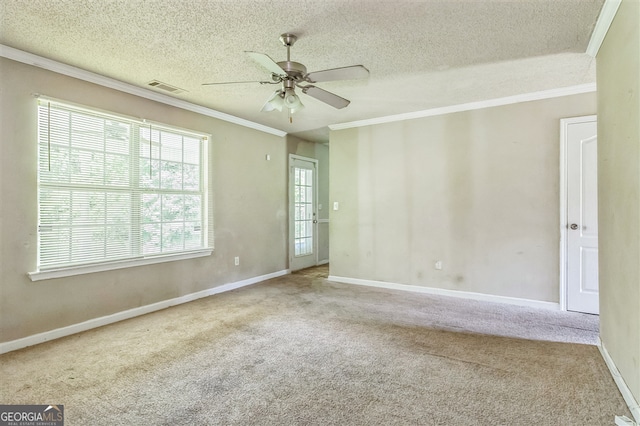 3376 Trotters Ridge Trl, Gray, GA 31032 - empty room featuring a ceiling fan, crown molding, carpet flooring, and a textured ceiling
