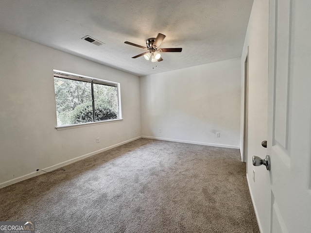 10173 Brass Ring Rd, Jonesboro, GA 30238 - carpeted empty room with ceiling fan and a textured ceiling