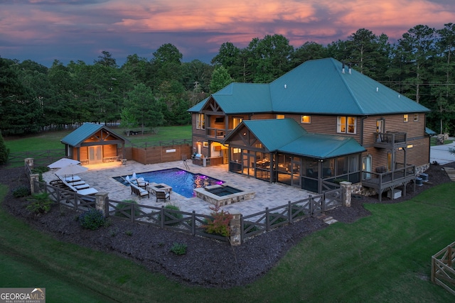 6590 Lights Ferry Rd, Flowery Branch, GA 30542 - view of swimming pool with a sunroom, a fenced backyard, a patio, an outdoor structure, and an in-ground hot tub