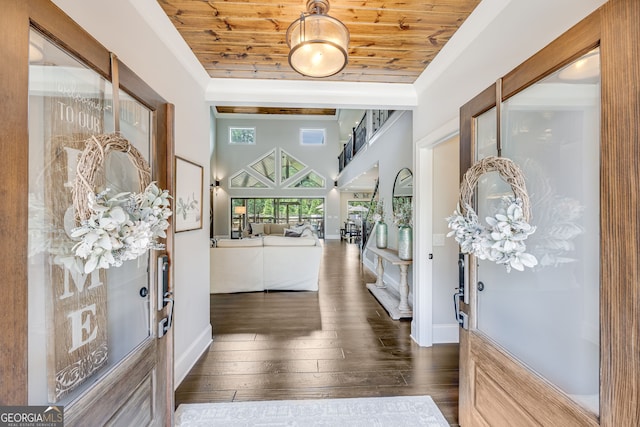 6590 Lights Ferry Rd, Flowery Branch, GA 30542 - foyer with wood ceiling, hardwood / wood-style floors, and a towering ceiling