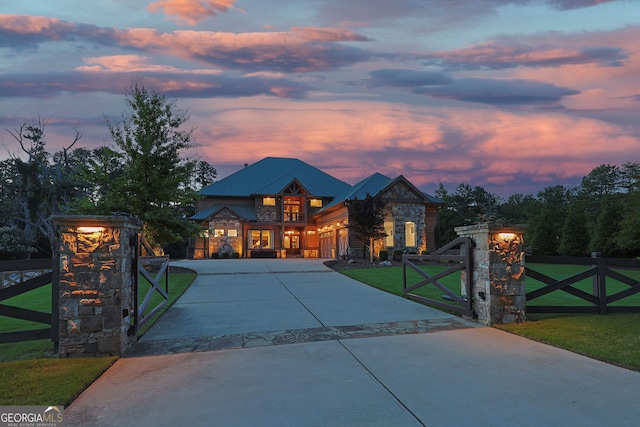 6590 Lights Ferry Rd, Flowery Branch, GA 30542 - view of front of home with a gate, driveway, and a fenced front yard