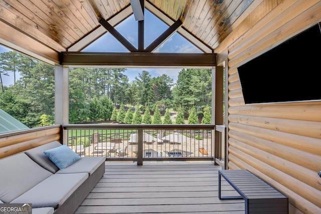 6590 Lights Ferry Rd, Flowery Branch, GA 30542 - deck featuring outdoor lounge area and view of scattered trees