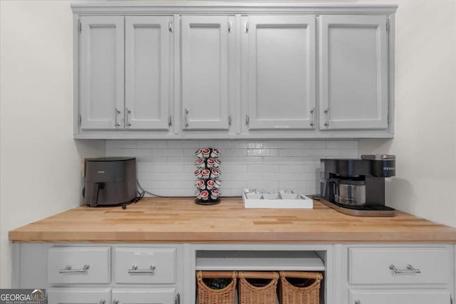 4735 Log Cabin Rd, Gainesville, GA 30504 - kitchen featuring butcher block counters and tasteful backsplash