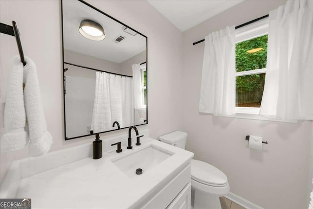 4735 Log Cabin Rd, Gainesville, GA 30504 - full bath with vanity, healthy amount of natural light, and a shower with shower curtain