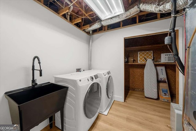 4735 Log Cabin Rd, Gainesville, GA 30504 - laundry area with washing machine and clothes dryer and wood finished floors