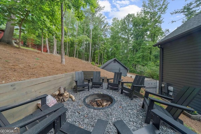 4735 Log Cabin Rd, Gainesville, GA 30504 - view of patio featuring a fire pit