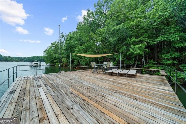 4735 Log Cabin Rd, Gainesville, GA 30504 - dock featuring a water view and outdoor dining space
