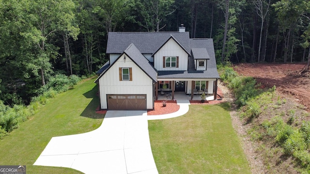 181 S Chattahoochee Dr, Hogansville, GA 30230 - modern inspired farmhouse with covered porch, a garage, concrete driveway, board and batten siding, and roof with shingles